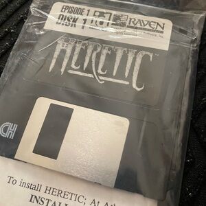 Sealed vintage heretic game. (2 discs ) offers welcome